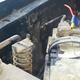 The battery was being over-charged and boiled over, emitting a horrible noxious smell.